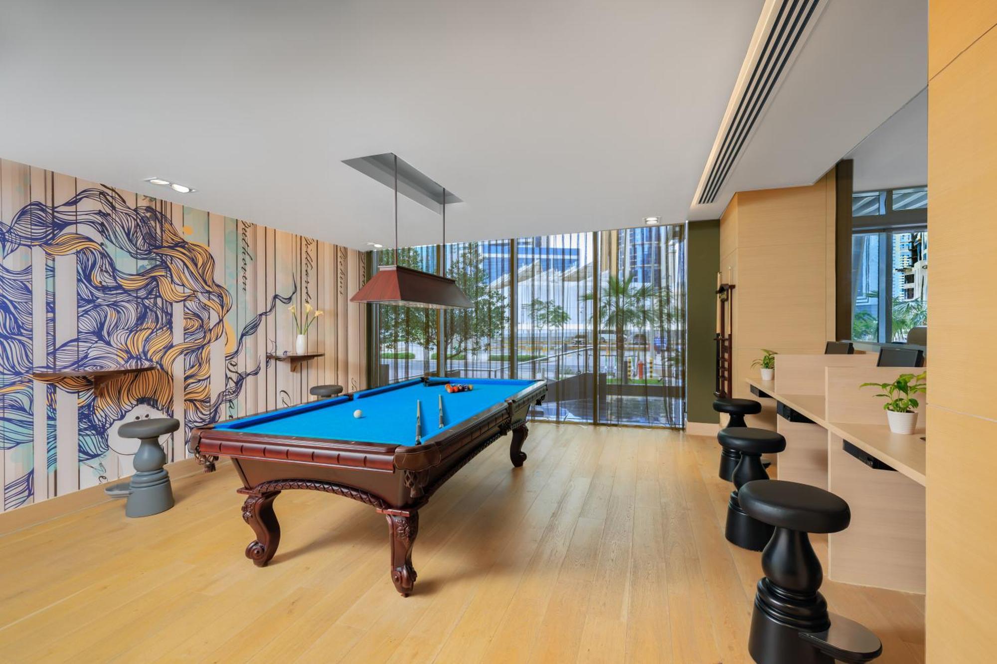 多哈萨默塞特西湾公寓式酒店 外观 照片 The Billiard Room