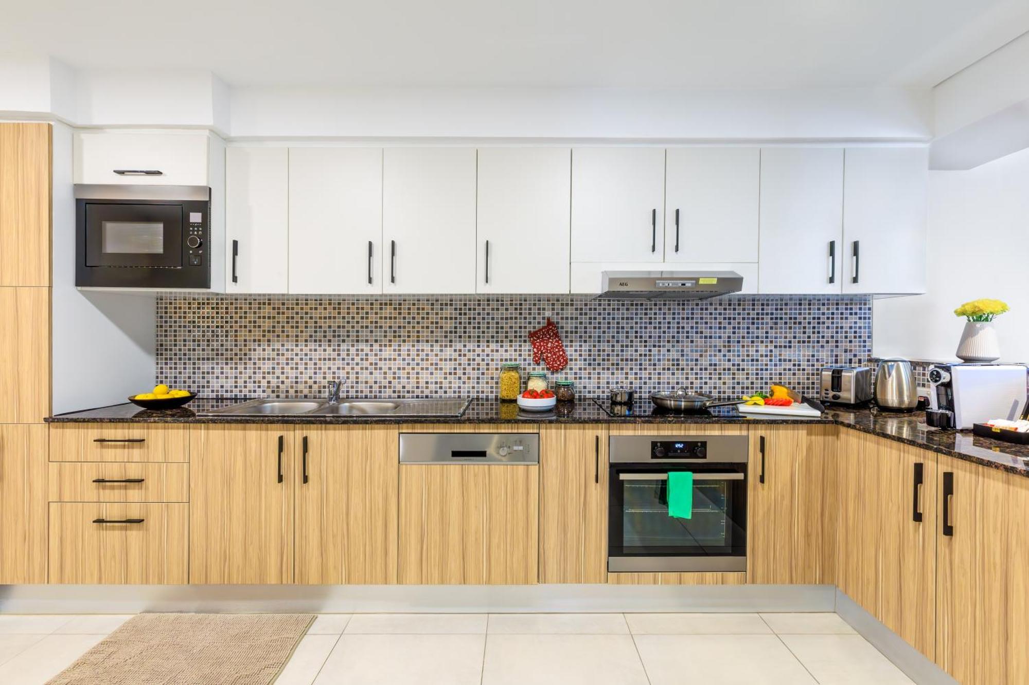 多哈萨默塞特西湾公寓式酒店 外观 照片 A modern Australian kitchen